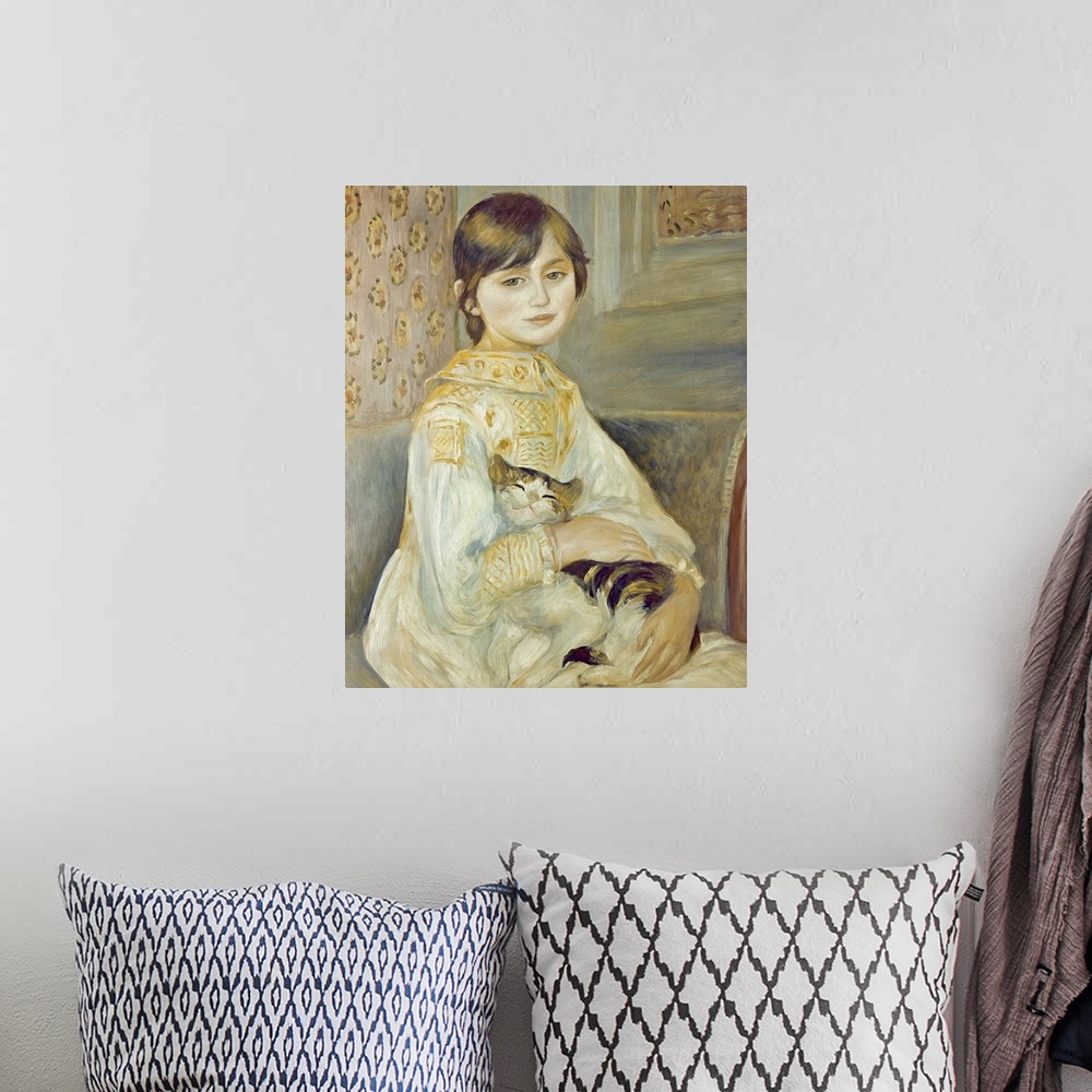 A bohemian room featuring Classic artwork of a small girl as she sits on a couch with her hands wrapped around the cat on h...
