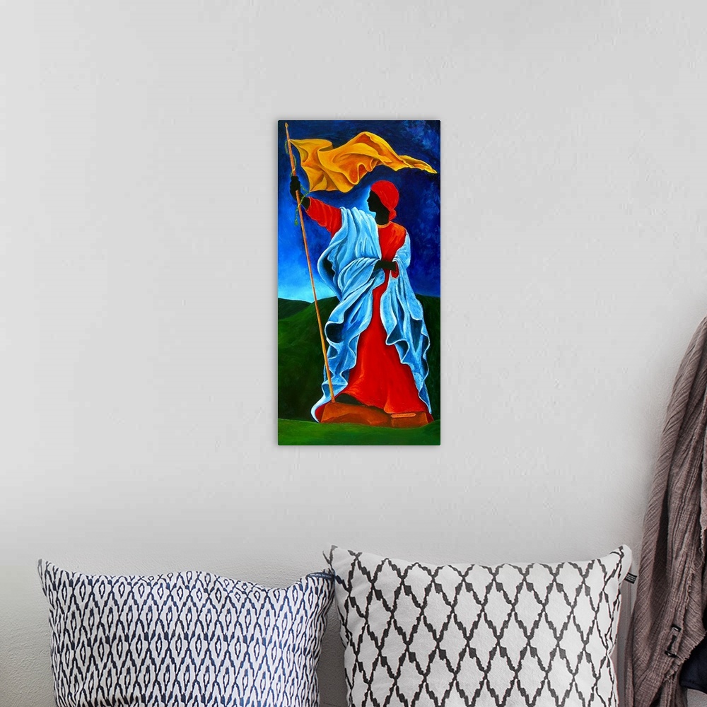 A bohemian room featuring Contemporary painting of a woman wearing red and blue robes flying a yellow flag.