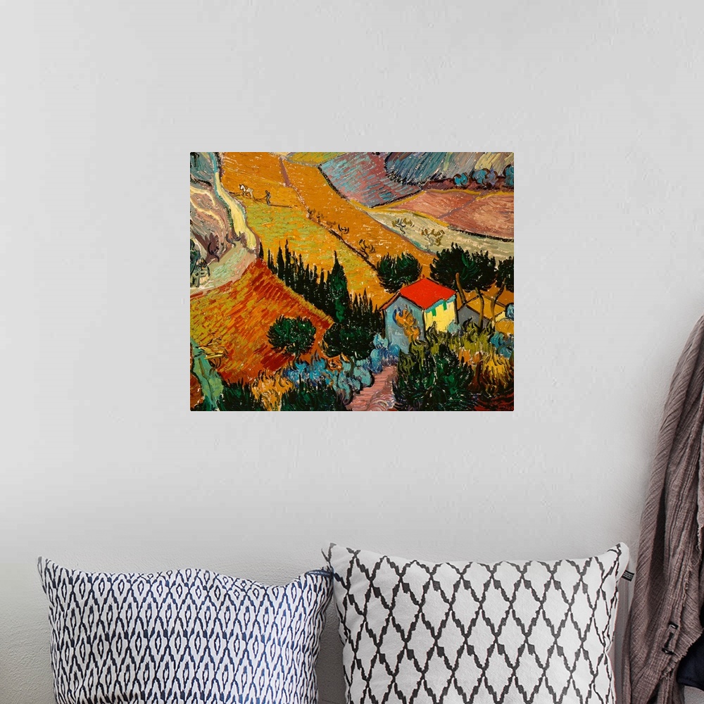 A bohemian room featuring Big classic art depicts an aerial view of a man and horse plowing a field on a farm within a vall...