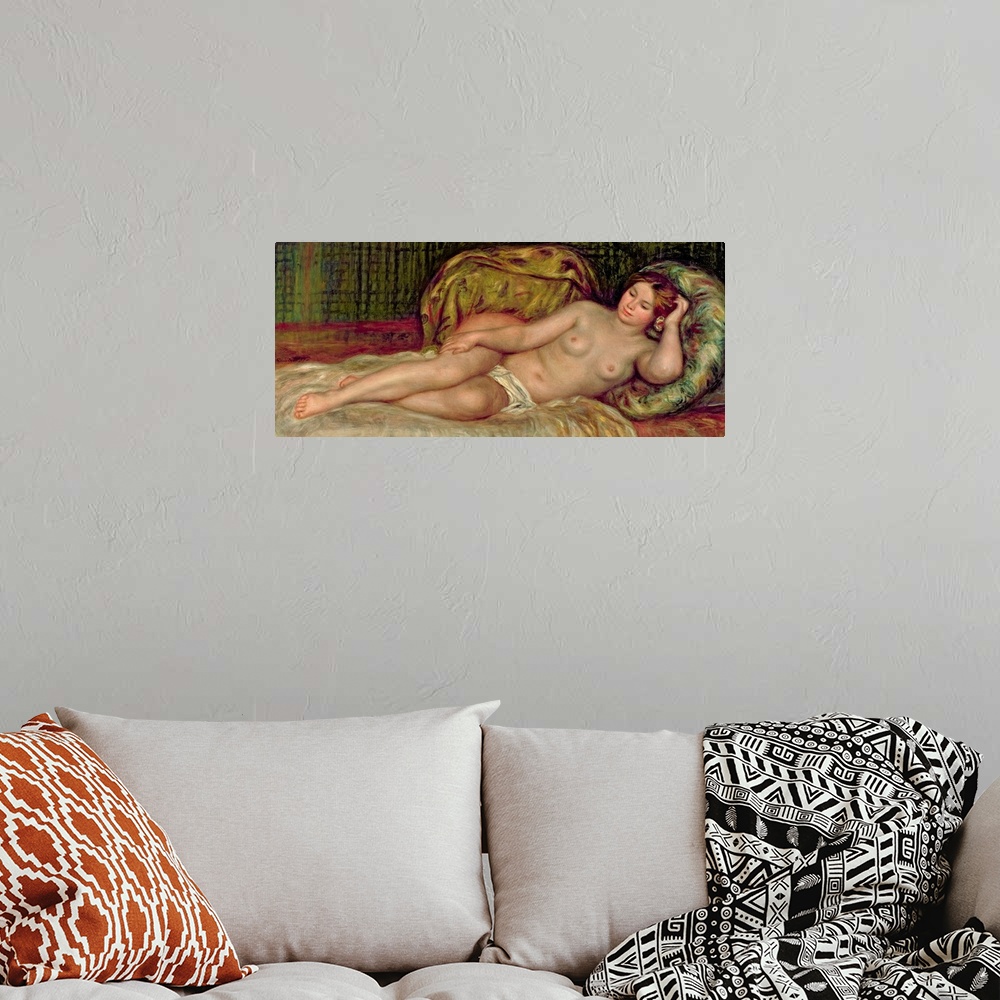 A bohemian room featuring Large, horizontal classic painting of a nude woman lying on a bed, surrounded by pillows.
