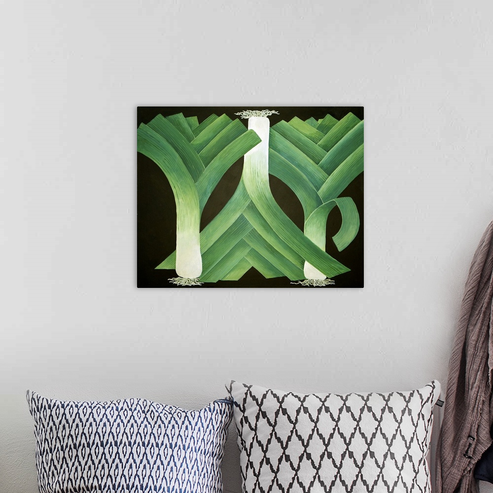 A bohemian room featuring Contemporary artwork of three leeks against a black background.