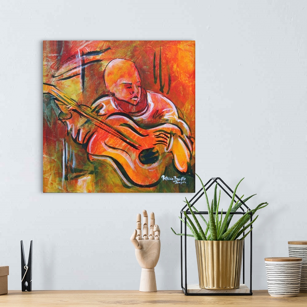 A bohemian room featuring Contemporary portrait of a Haitian man playing a stringed instrument.
