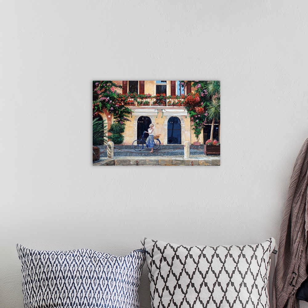 A bohemian room featuring Big oil painting on canvas of a woman riding a bike through an Italian street.