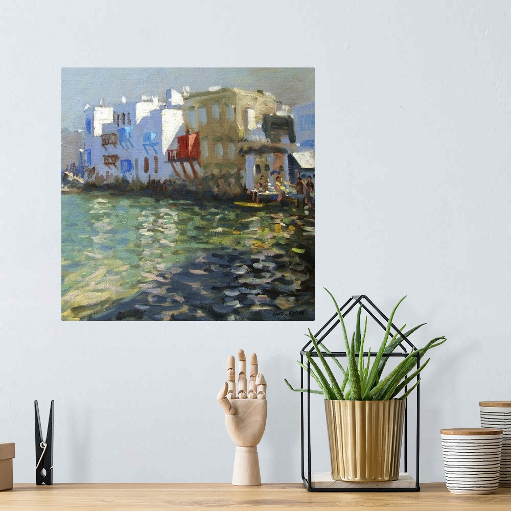 A bohemian room featuring A soft, impressionist-style painting of a buildings overlooking the sea on the island of Mykonos ...