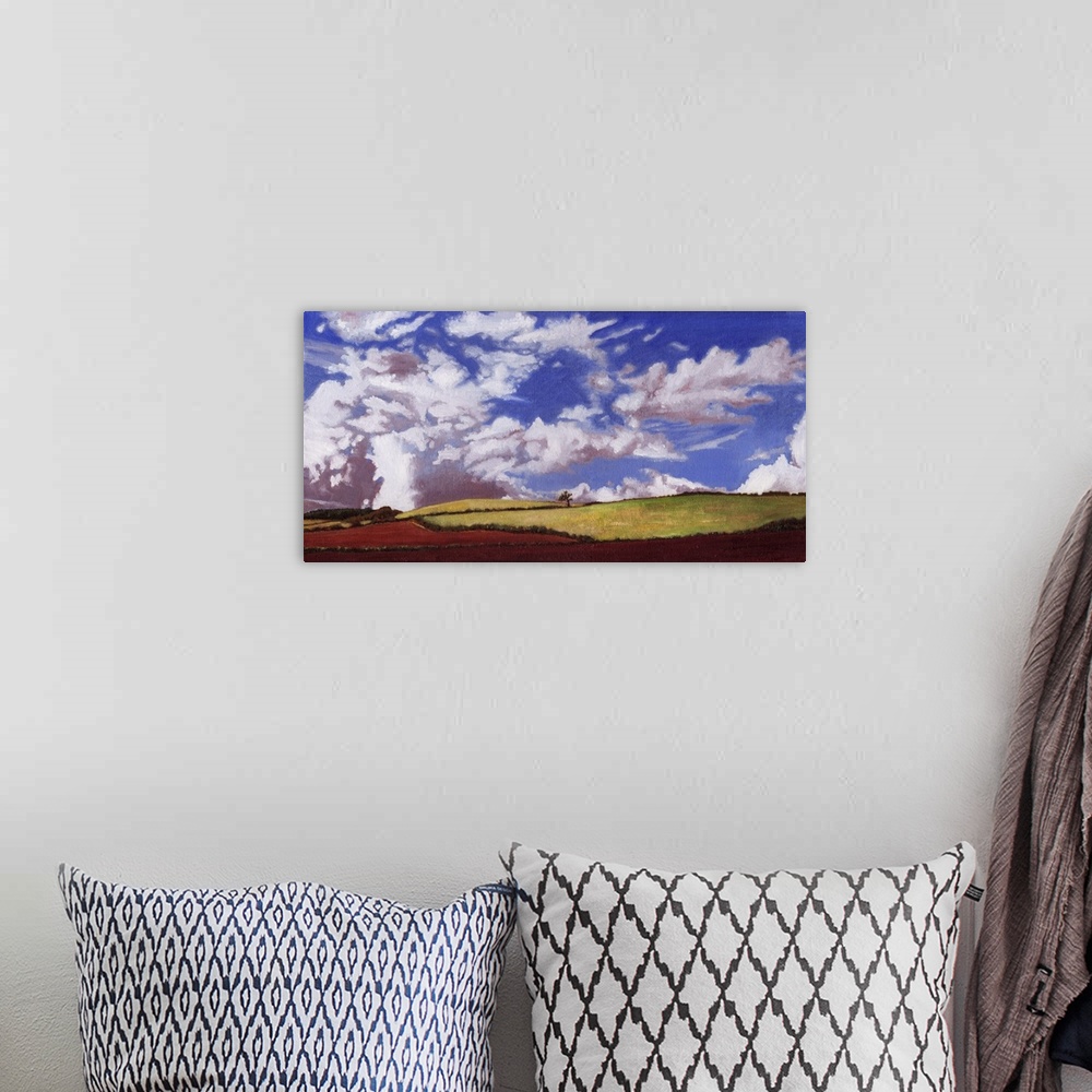 A bohemian room featuring Contemporary painting of a countryside scene.