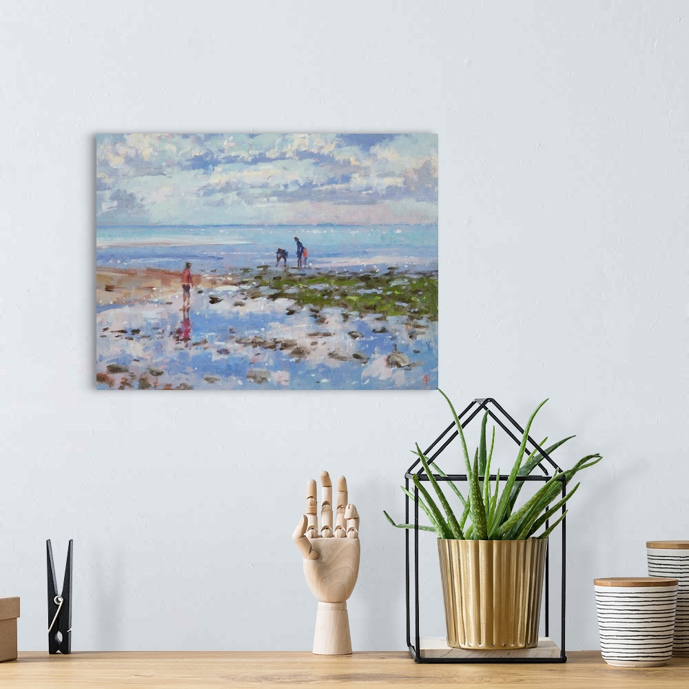A bohemian room featuring Contemporary painting of three people at the beach, looking at tide pools.