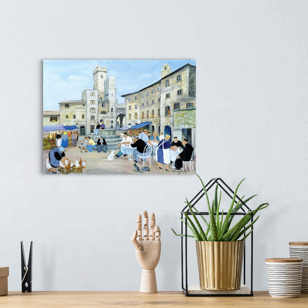 A bohemian room featuring Contemporary painting of people eating outdoors in a Tuscan town.