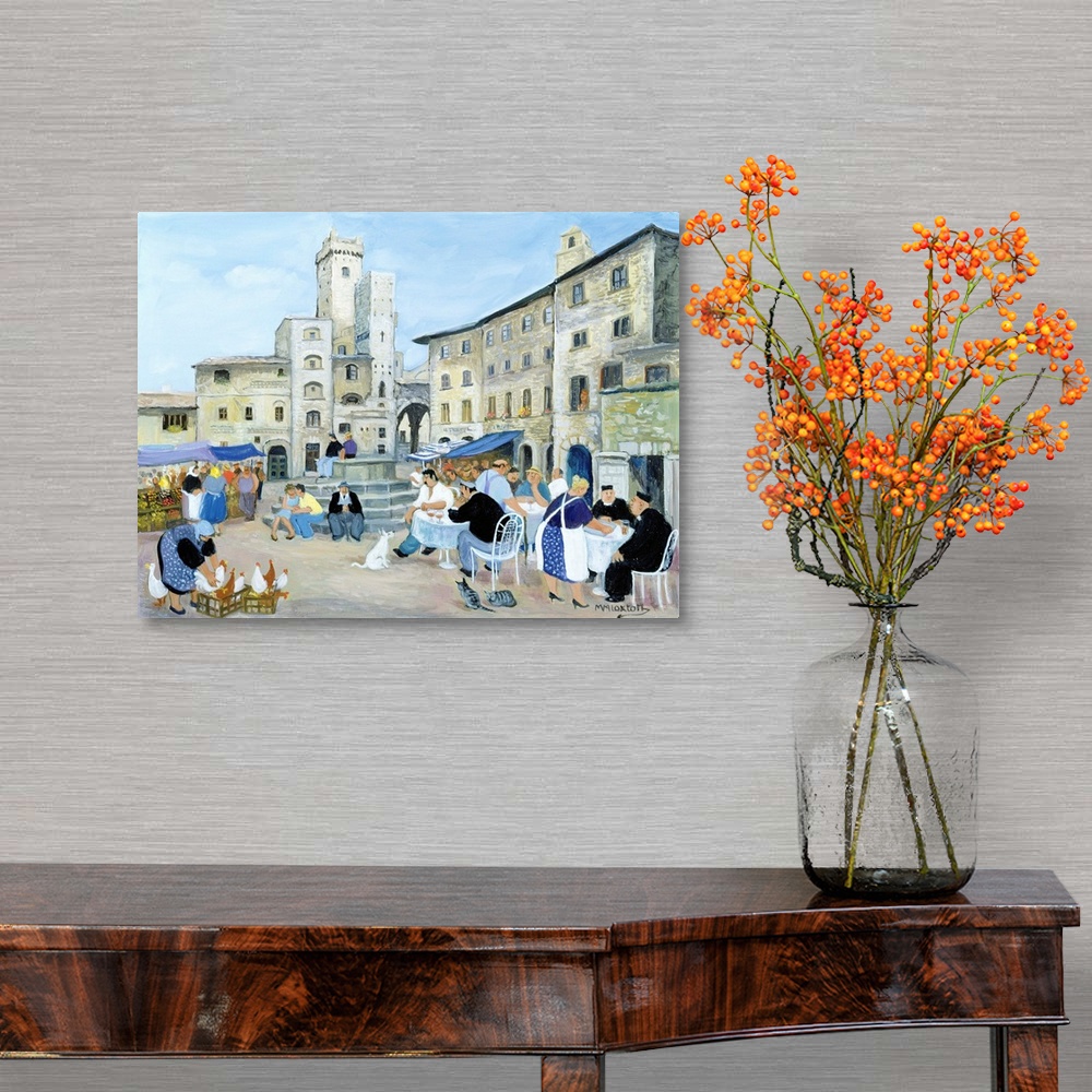 A traditional room featuring Contemporary painting of people eating outdoors in a Tuscan town.