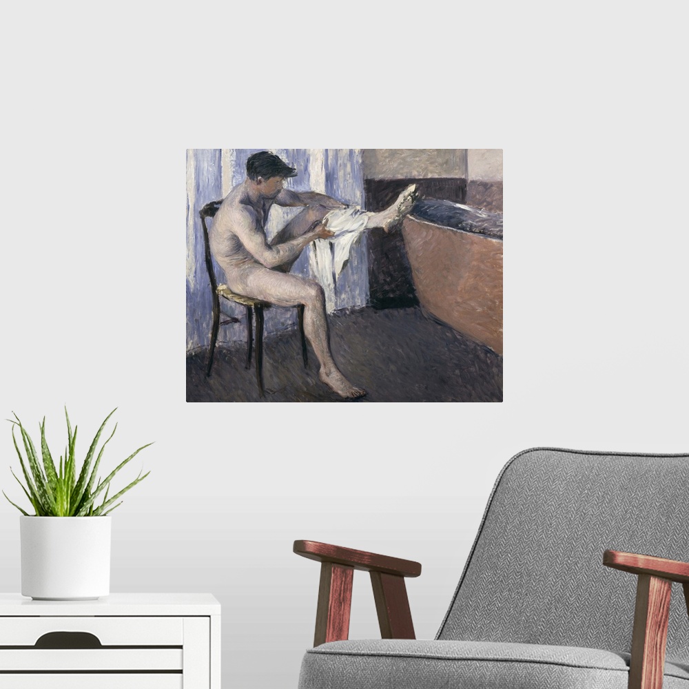 A modern room featuring Man Drying His Leg