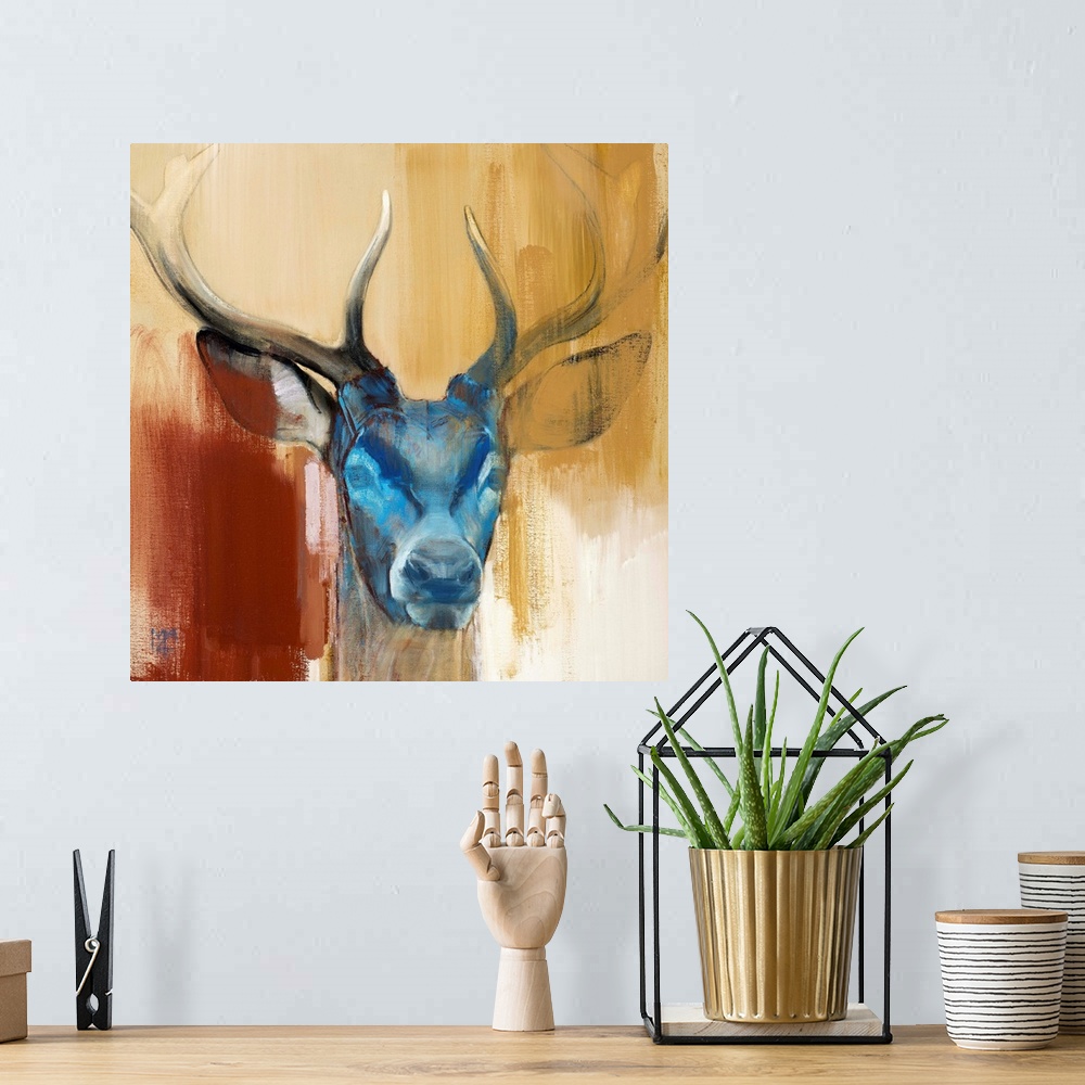 A bohemian room featuring Contemporary artwork of a stag with a blue face against an earthy background.