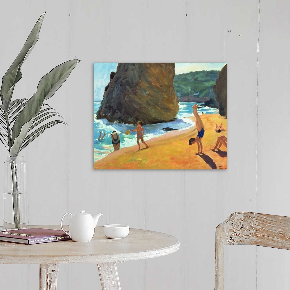 A farmhouse room featuring Horizontal painting on a big canvas of people playing on the beach, near the water, large boulder...