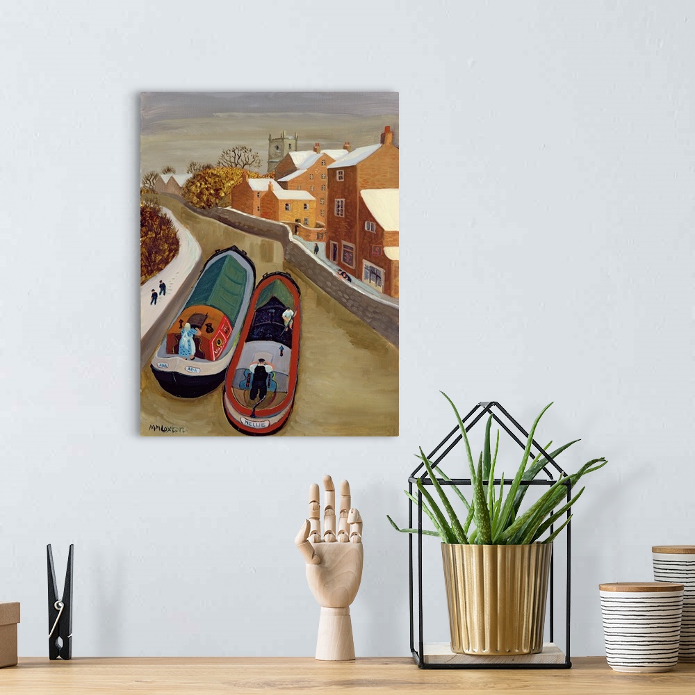 A bohemian room featuring Contemporary painting of two boats in a canal in the city.