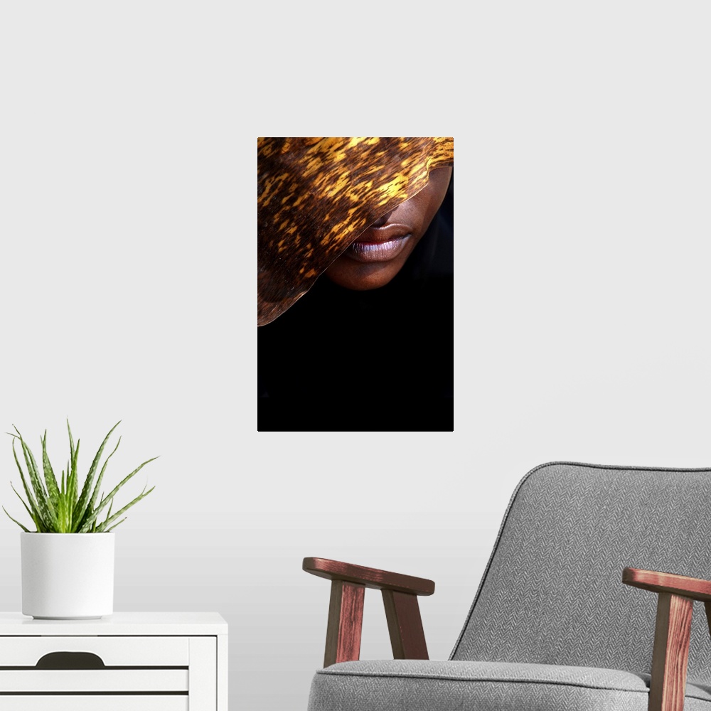 A modern room featuring A contemporary fine art photograph of the lower part of a woman's face, the rest of which is hidd...