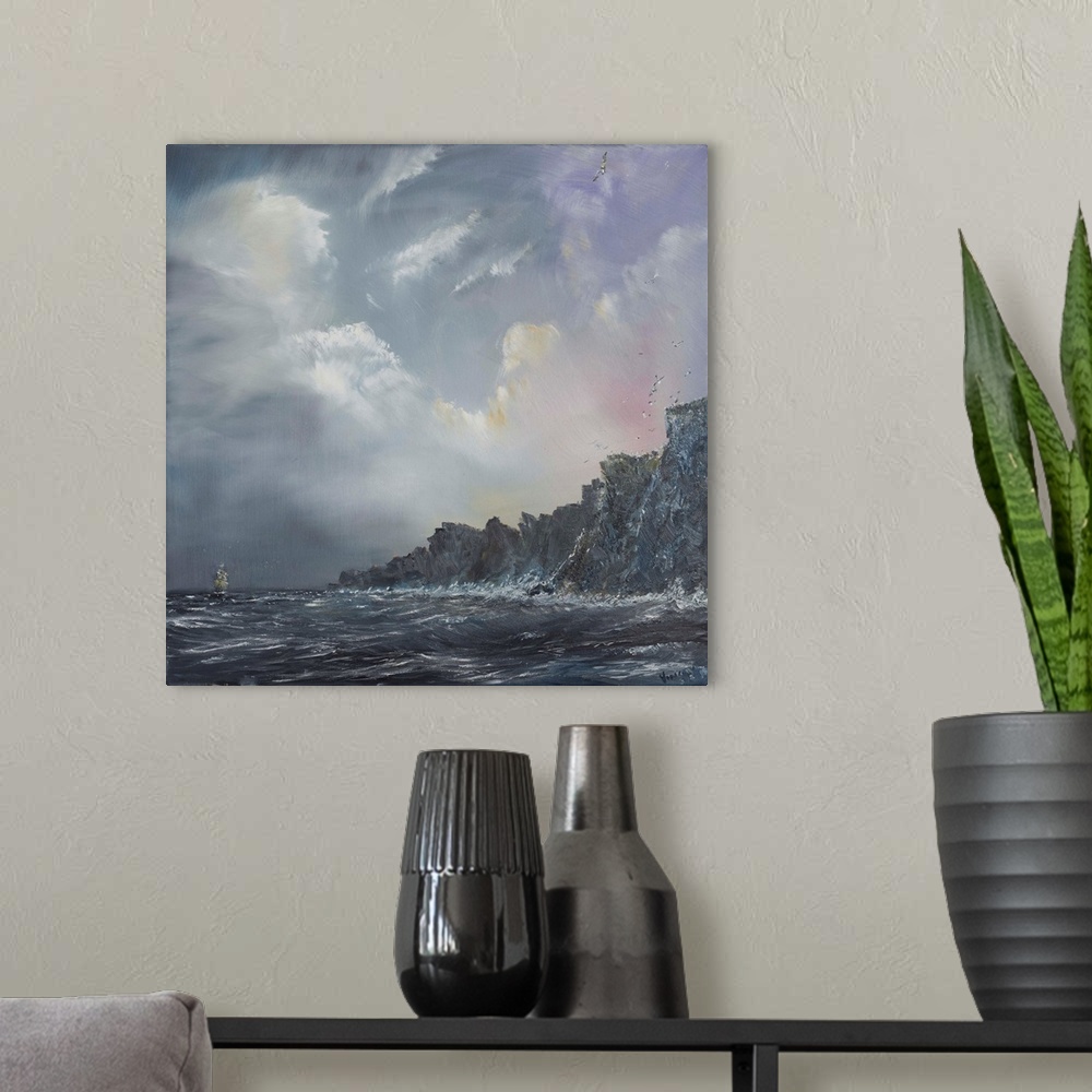 A modern room featuring Contemporary painting of a ship out to sea near cliffs of a coast.
