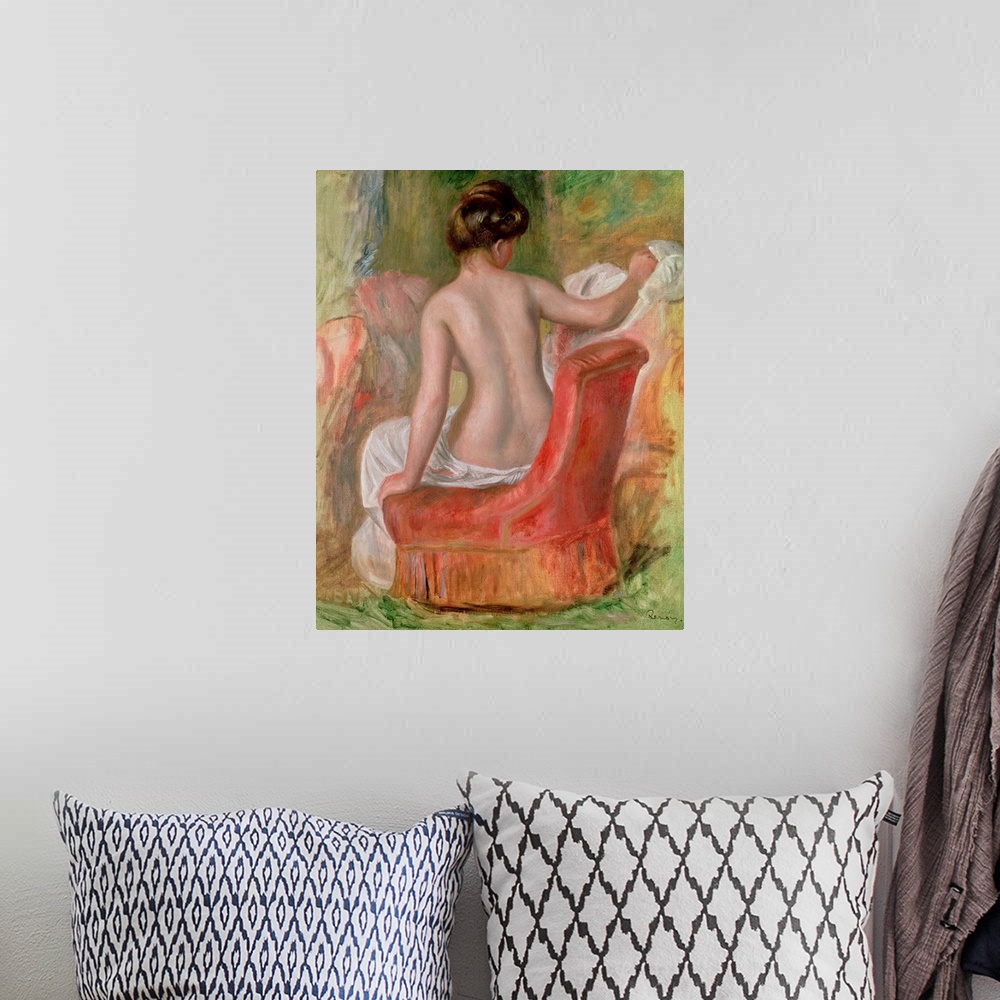 A bohemian room featuring Vertical, classic painting of  the back of a woman, nude from the waist up, sitting on a chair.