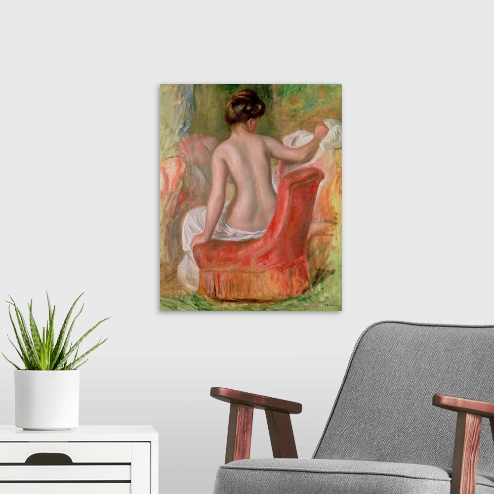A modern room featuring Vertical, classic painting of  the back of a woman, nude from the waist up, sitting on a chair.