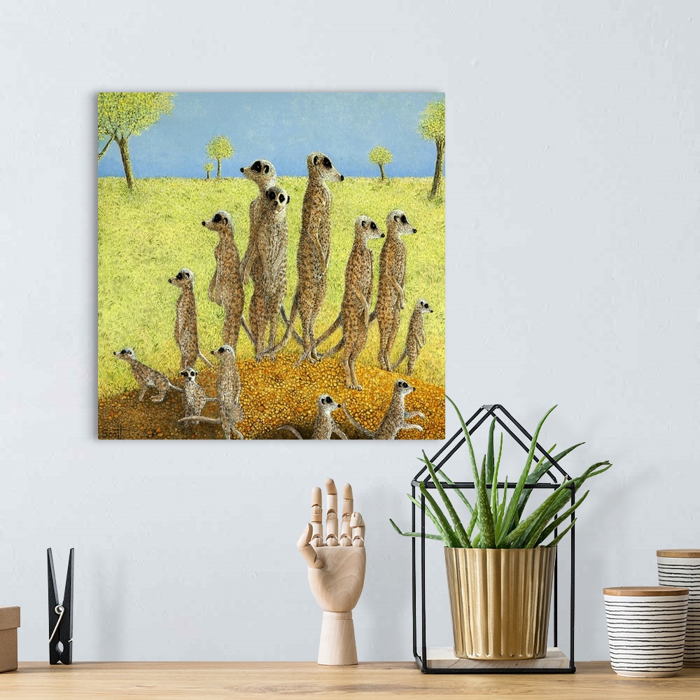 A bohemian room featuring Contemporary artwork of a family of meerkats standing upright on a mound looking out for predators.