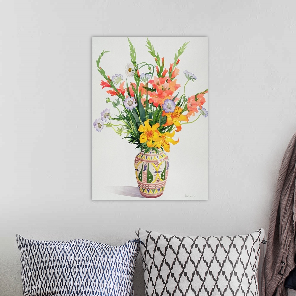 A bohemian room featuring Orange and Blue Flowers in a Moroccan Vase