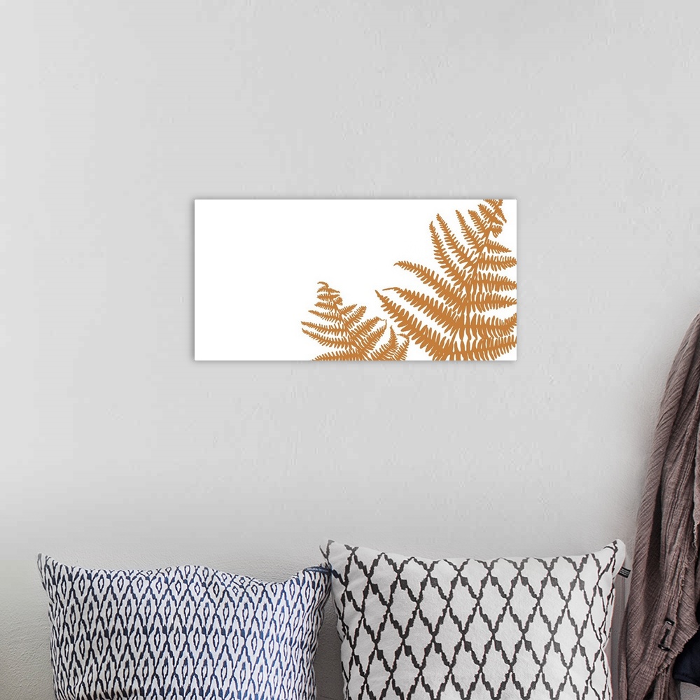 A bohemian room featuring An orange fern frond against a white background.