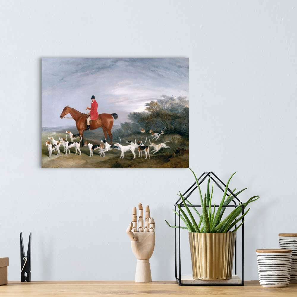A bohemian room featuring Oil painting of hunter on horseback surrounded by several hunting dogs.
