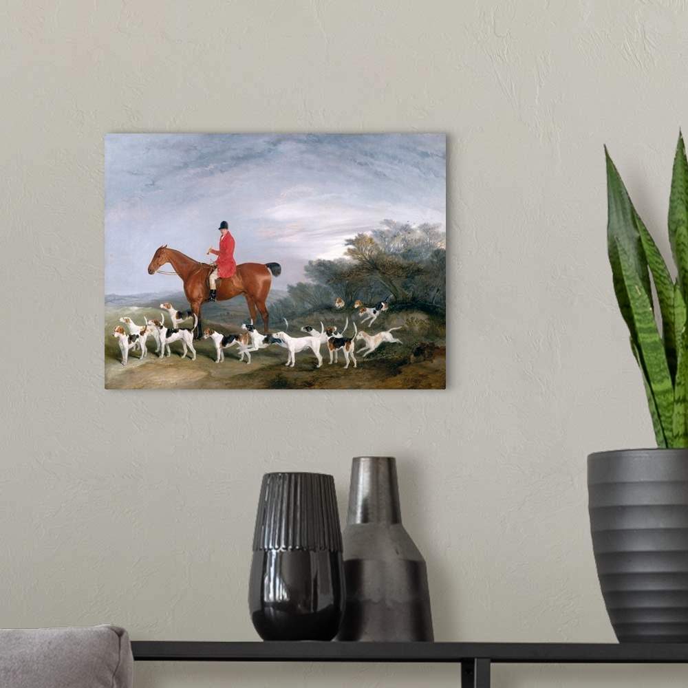 A modern room featuring Oil painting of hunter on horseback surrounded by several hunting dogs.