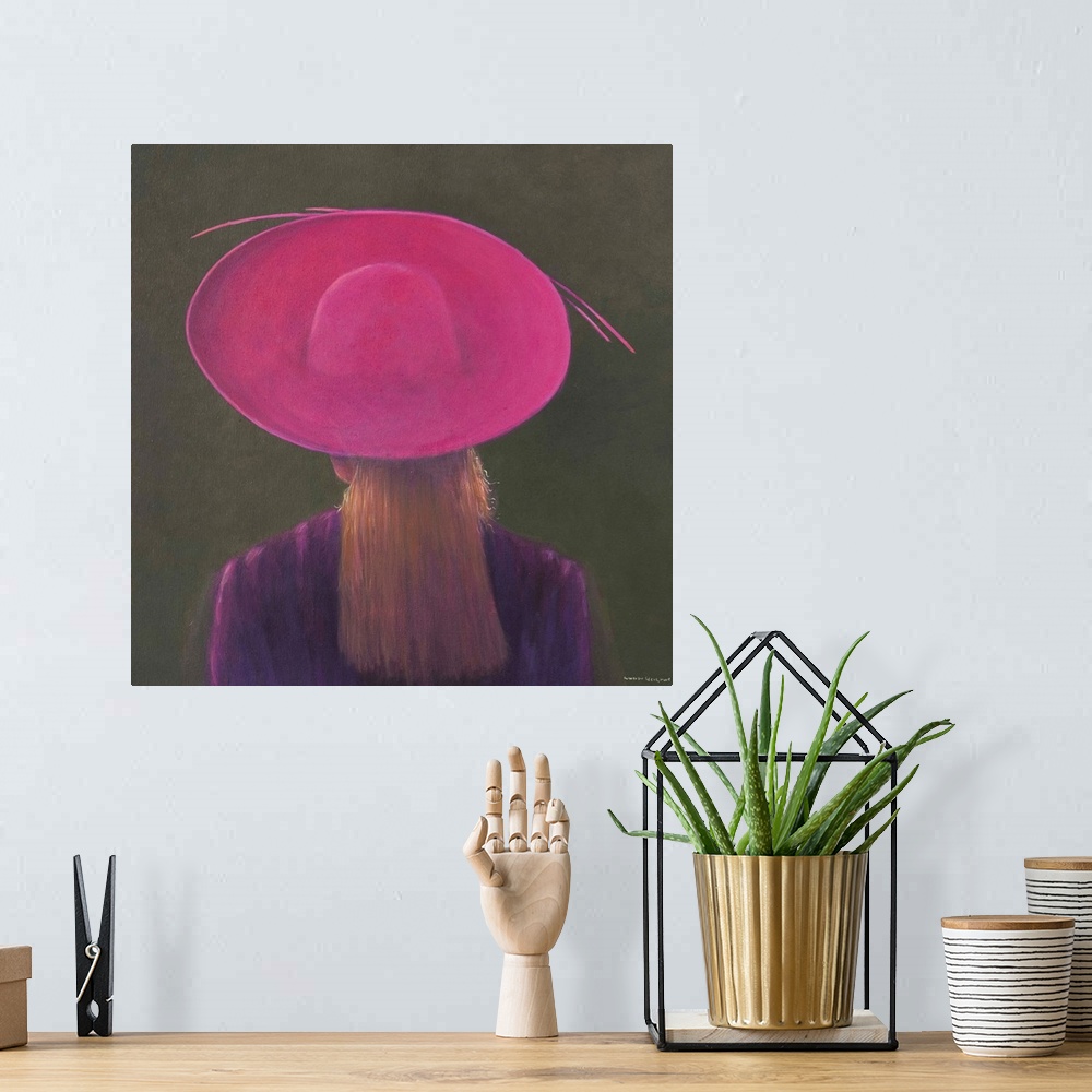 A bohemian room featuring Contemporary painting of a rear view of a woman wearing a pink hat.