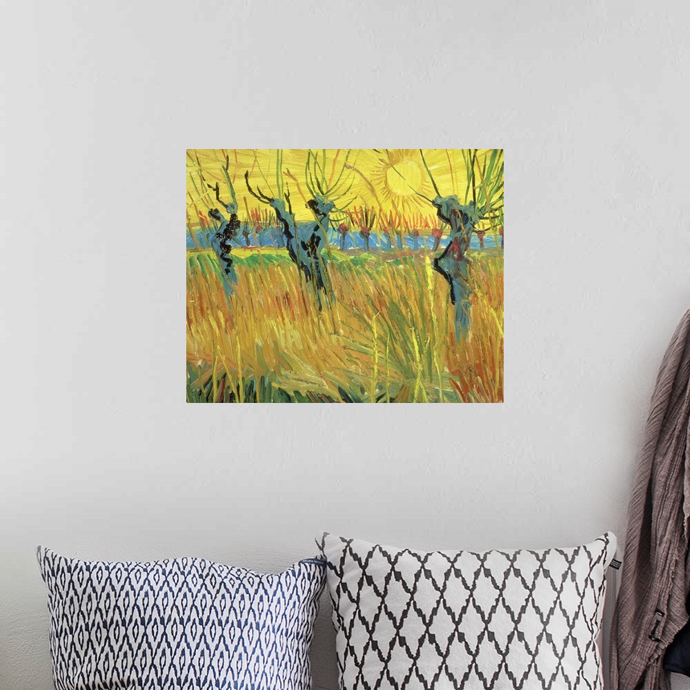 A bohemian room featuring Classical art painting of willow trees sticking up in high grass as the sun sets in the background.