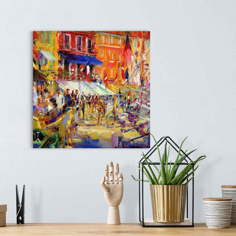 A bohemian room featuring Colorful bright oil painting of street carnival with flags blowing in the wind.