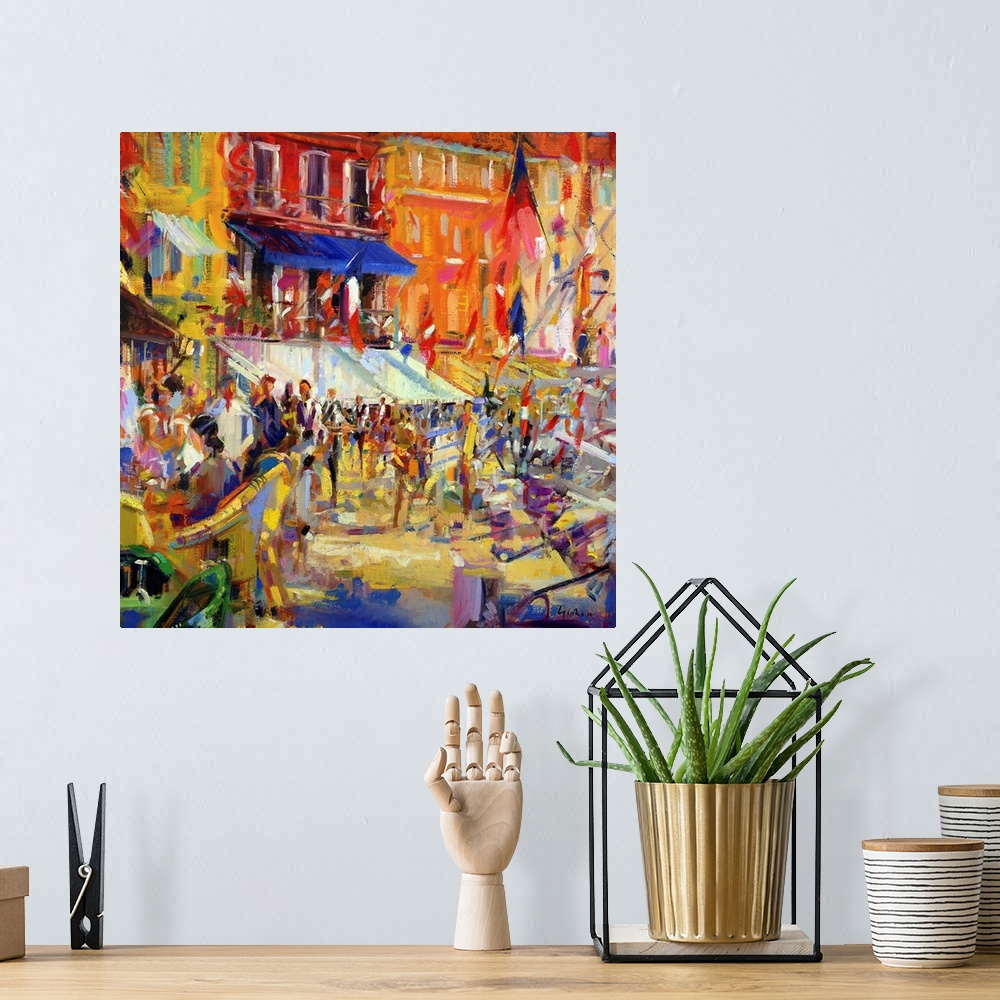 A bohemian room featuring Colorful bright oil painting of street carnival with flags blowing in the wind.