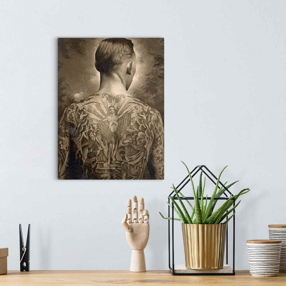 A bohemian room featuring Portrait of a tattooed man