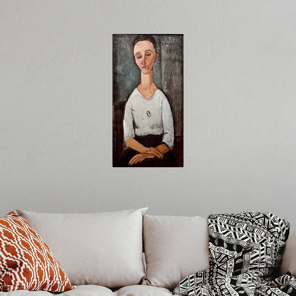A bohemian room featuring Portrait of Mrs. Chakoska. Painting by Amedeo Modigliani (1884-1920), 1917.