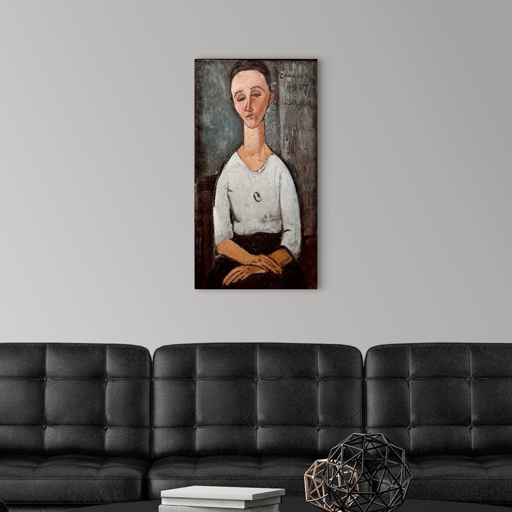A modern room featuring Portrait of Mrs. Chakoska. Painting by Amedeo Modigliani (1884-1920), 1917.