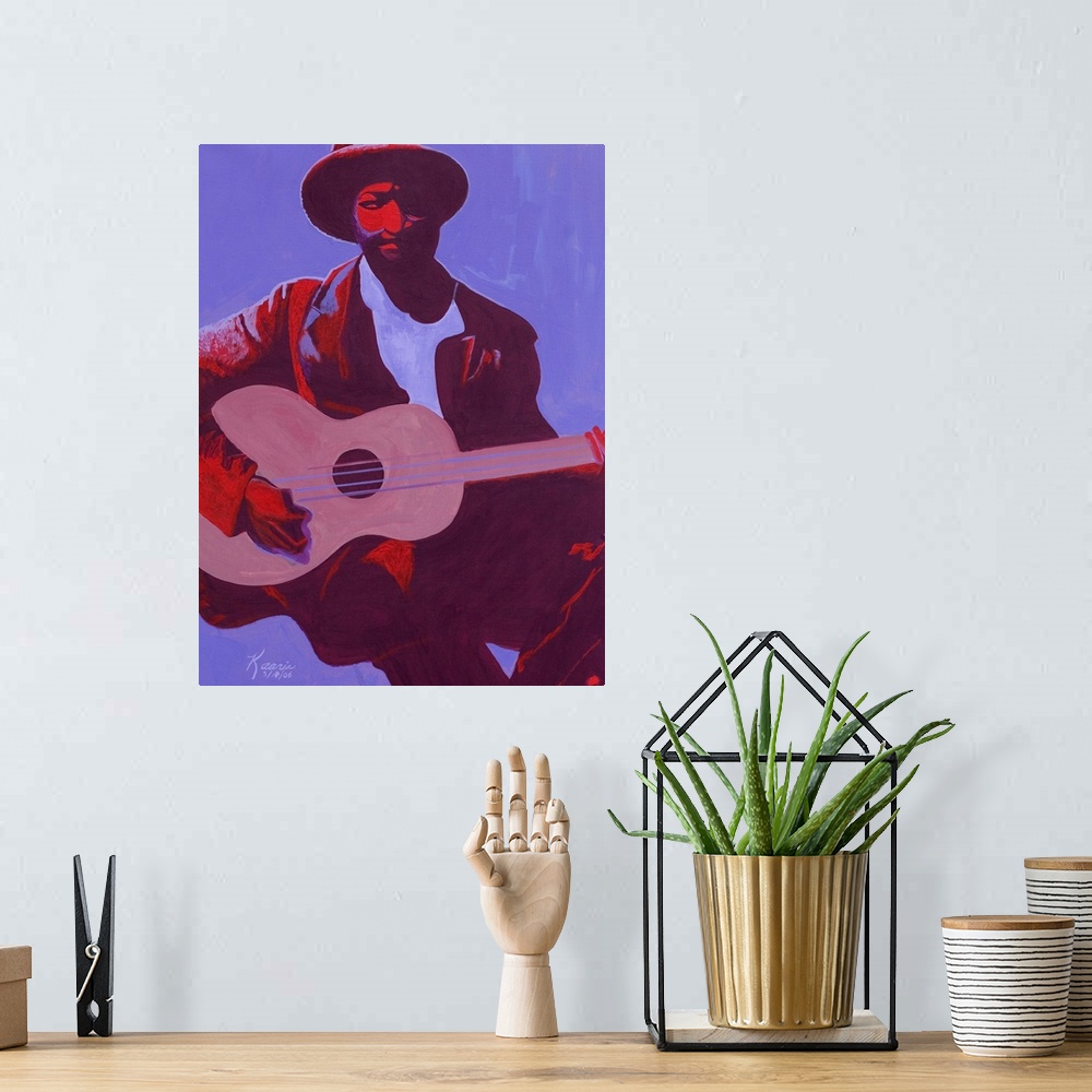 A bohemian room featuring Contemporary artwork of a musician holding a guitar while sitting down. Half of his body is shado...