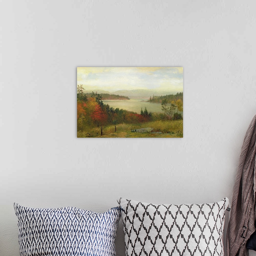 A bohemian room featuring Painting of river surrounded by fall forest with mountains in the distance under a cloudy sky.