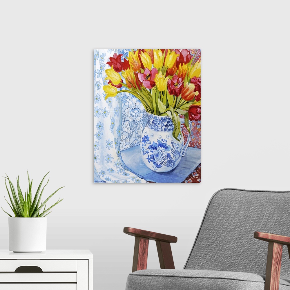 A modern room featuring Red and yellow tulips in a Copeland jug
