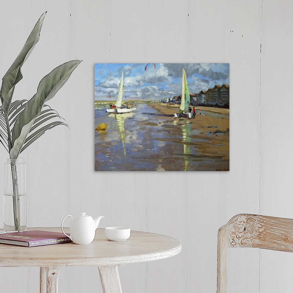 A farmhouse room featuring Piece of contemporary artwork that has two sail boats about to set off in the ocean. The beach is...