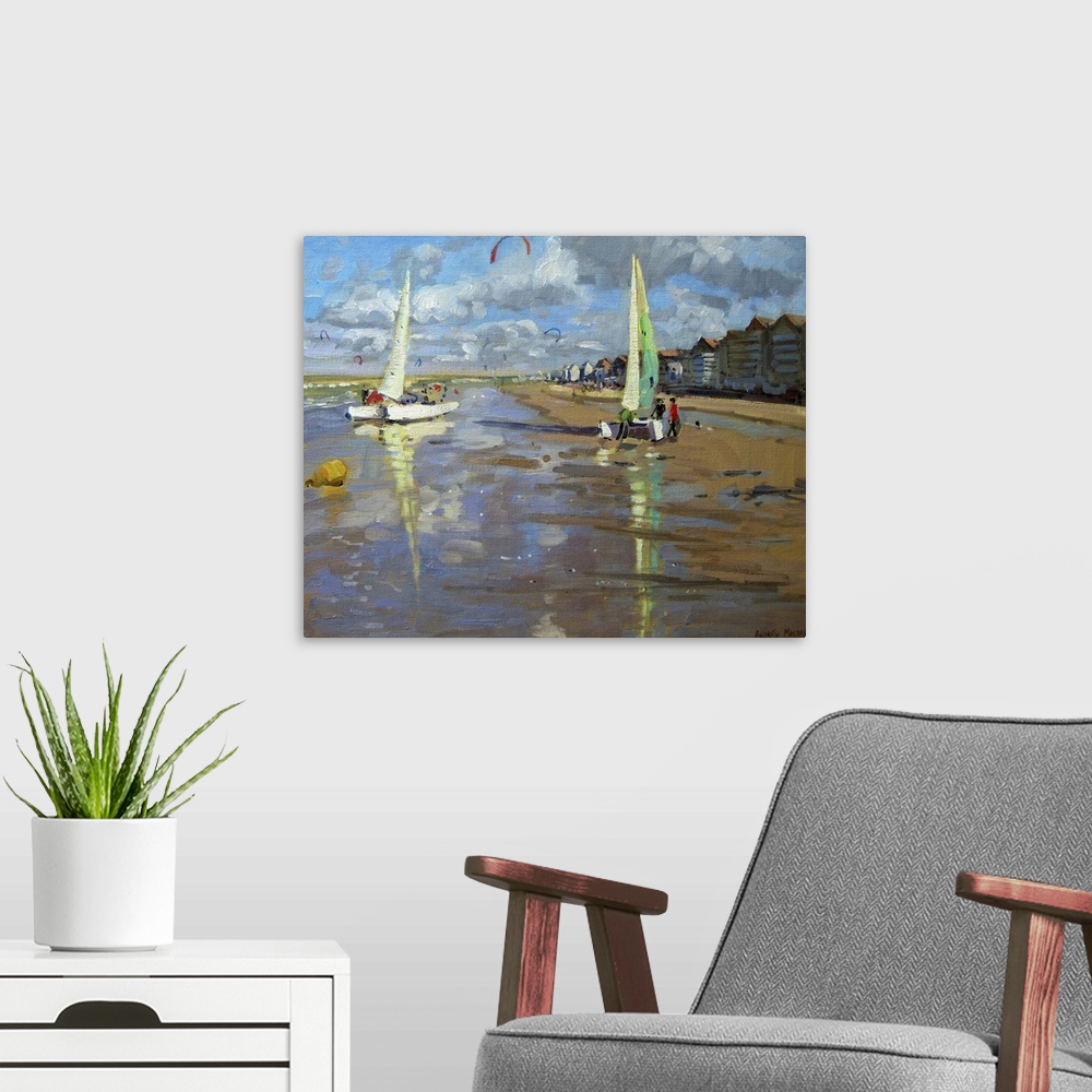 A modern room featuring Piece of contemporary artwork that has two sail boats about to set off in the ocean. The beach is...