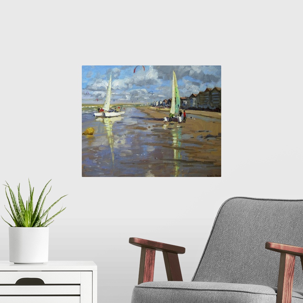 A modern room featuring Piece of contemporary artwork that has two sail boats about to set off in the ocean. The beach is...