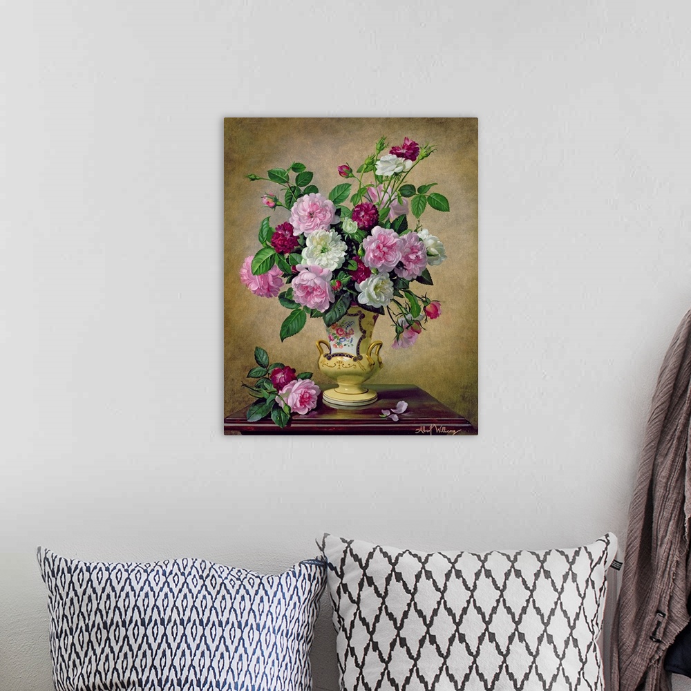 A bohemian room featuring Roses and dahlias in a ceramic vase