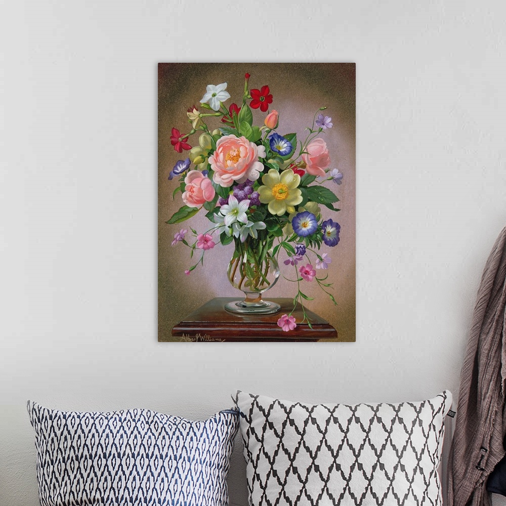 A bohemian room featuring Roses, Peonies and Freesias in a glass vase