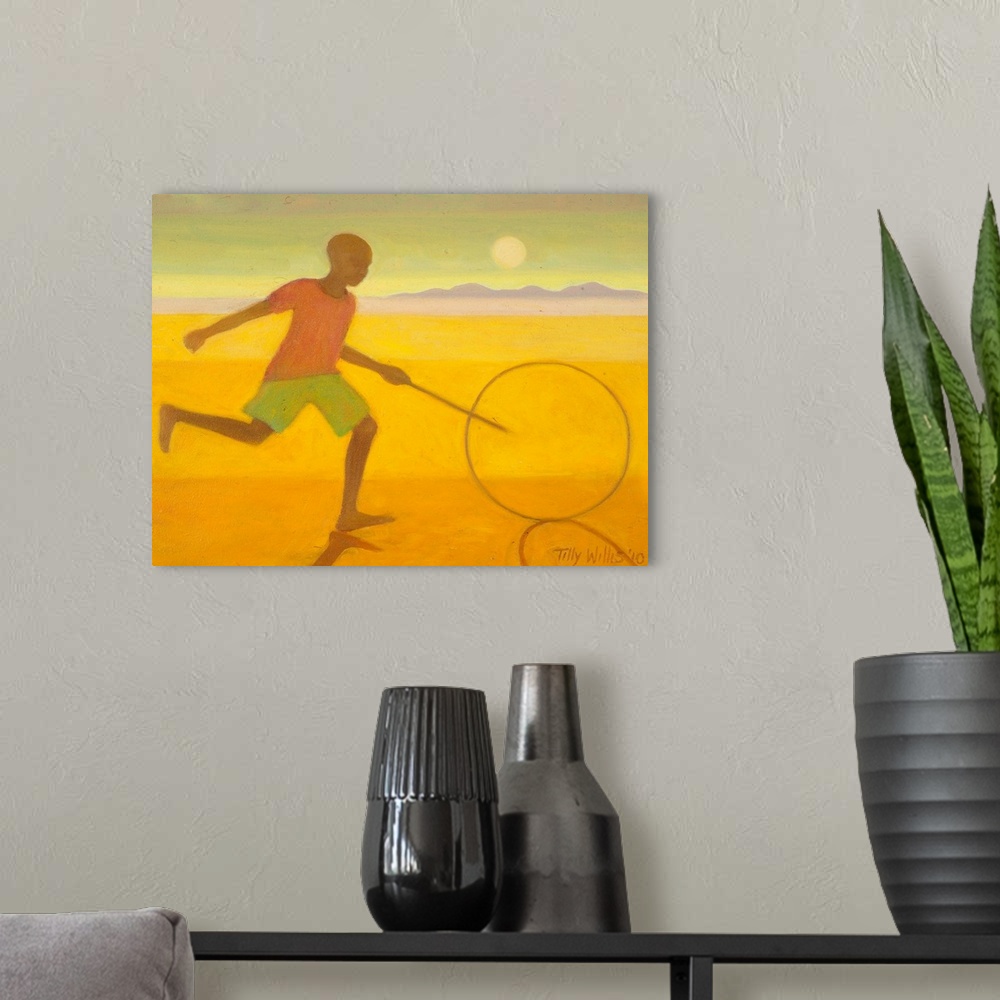 A modern room featuring Contemporary artwork of a boy running on the beach with a hoop and stick.