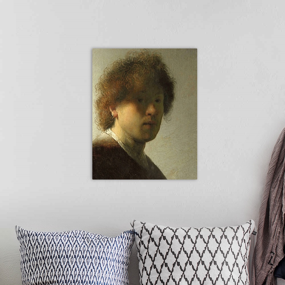 A bohemian room featuring Self portrait of Rembrandt as a young man.