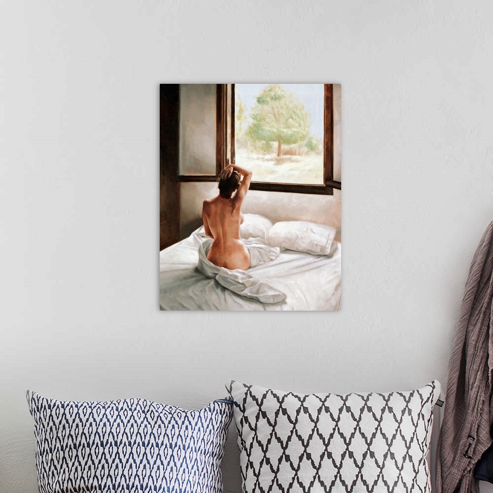 A bohemian room featuring An oil painting of a nude woman sitting up in bed with only a view of her back looking out a larg...