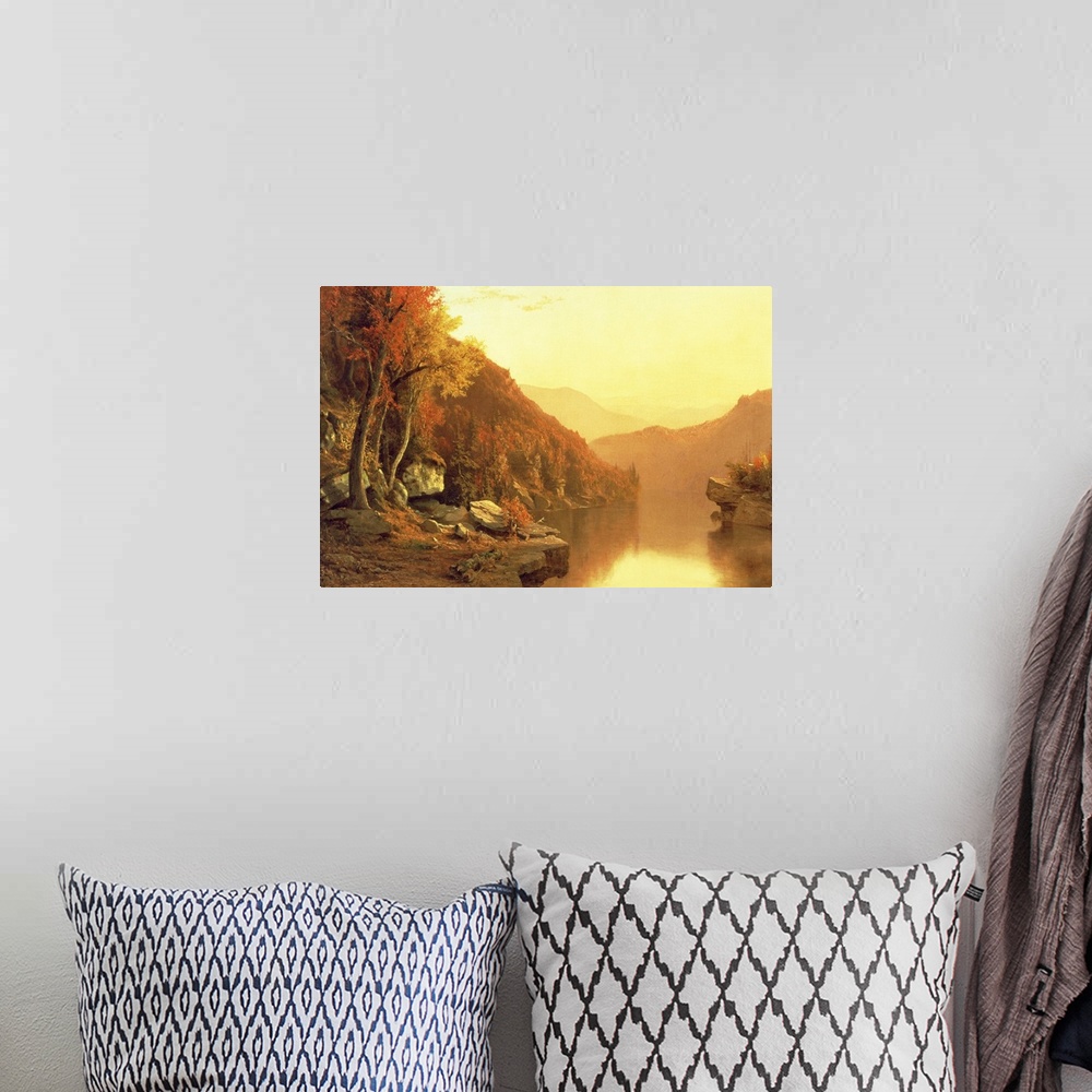 A bohemian room featuring A large oil painting done of mountains during the fall season with a river running through it and...