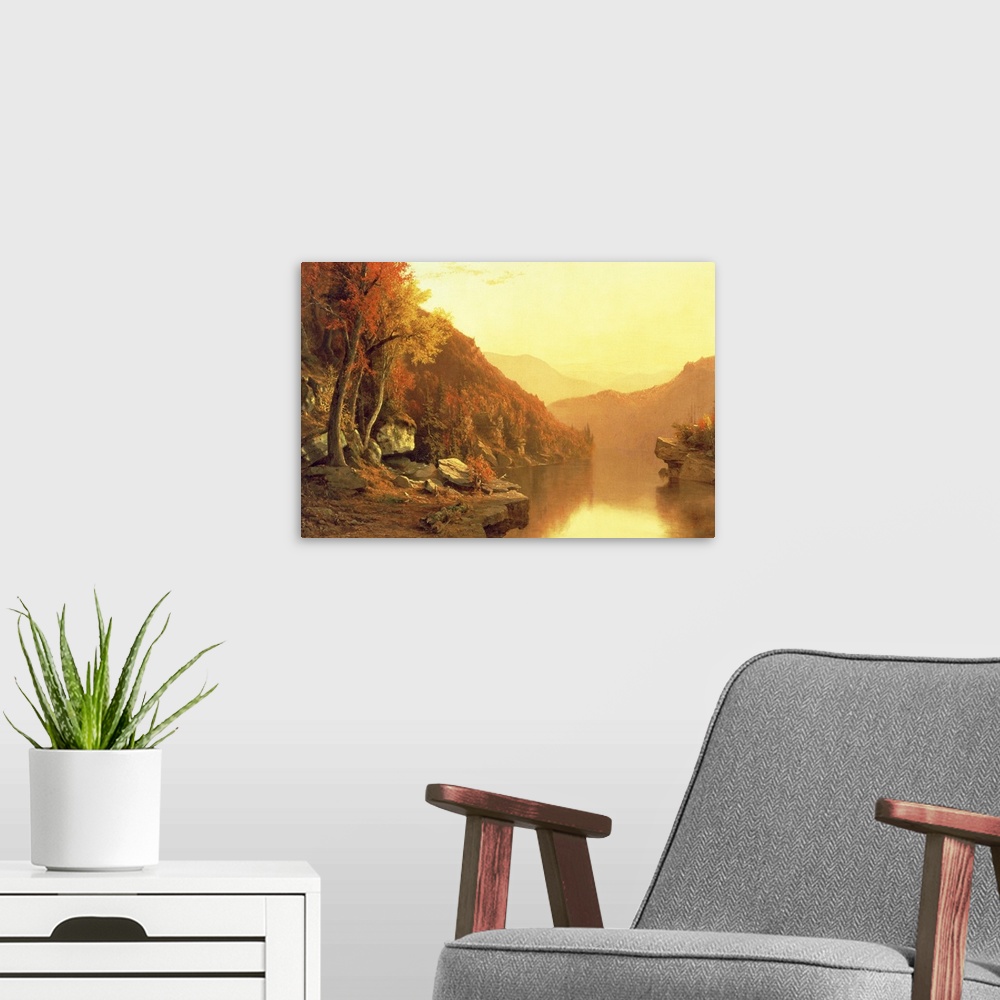 A modern room featuring A large oil painting done of mountains during the fall season with a river running through it and...