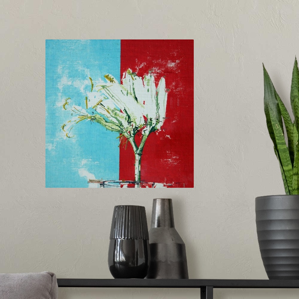 A modern room featuring White flower against a blue and red background.