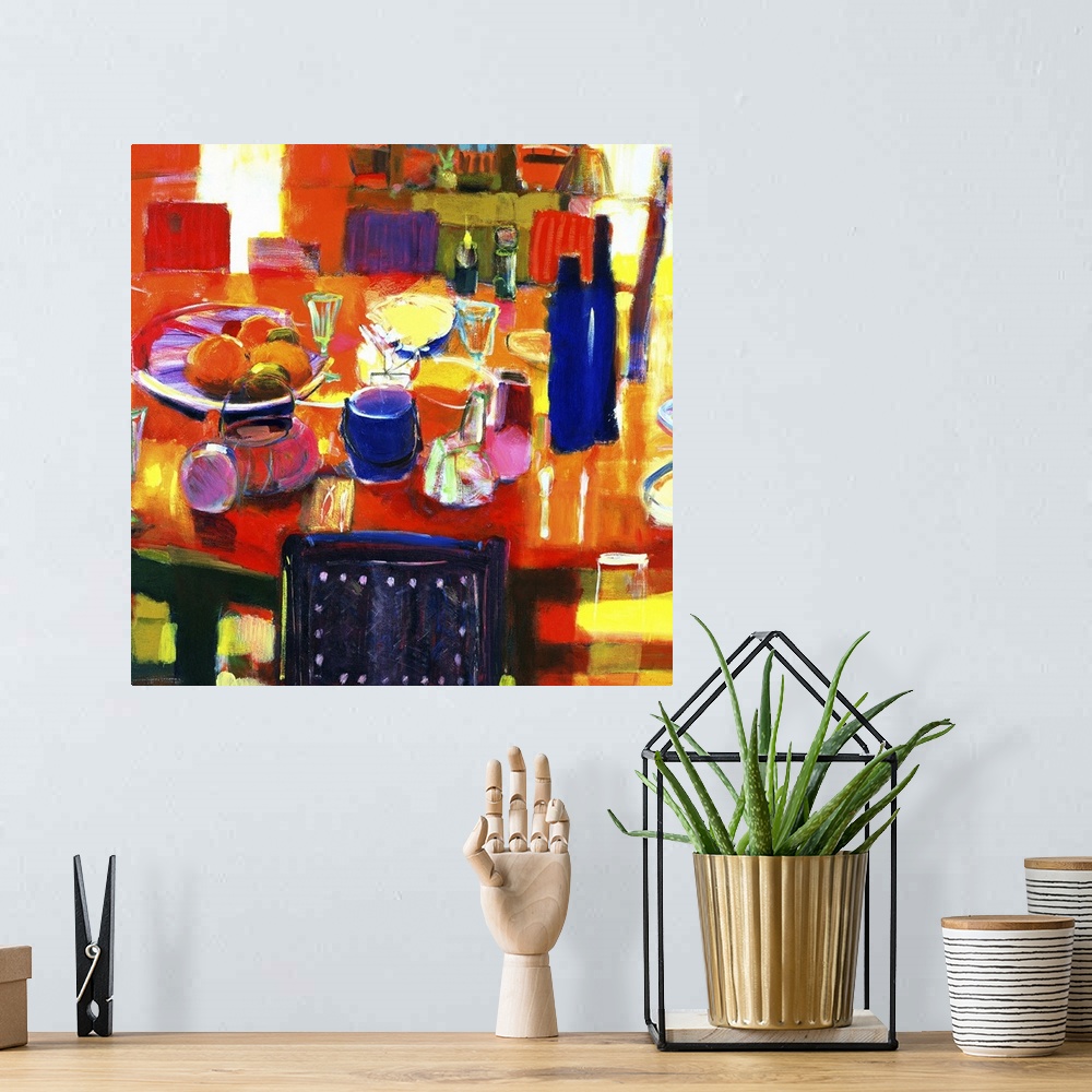 A bohemian room featuring Acrylic painting of items on a dinner table surrounded by chairs.  Some of the items include, a b...