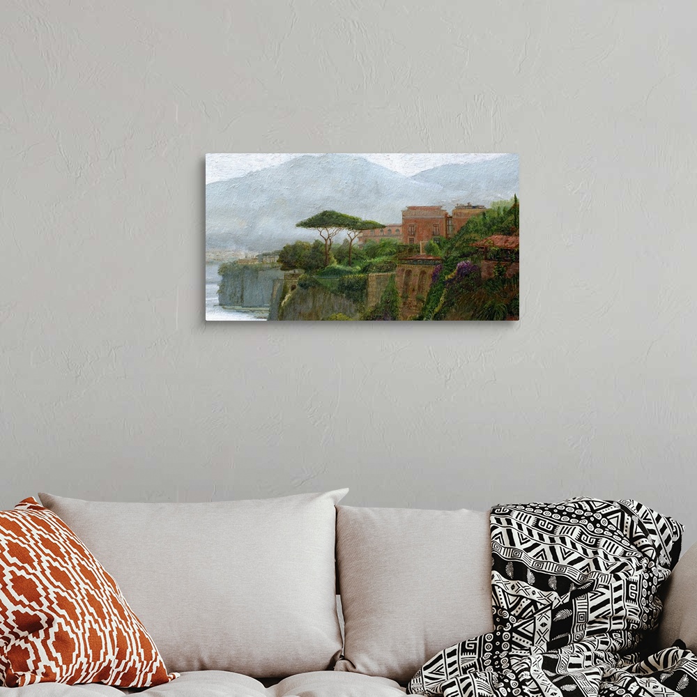 A bohemian room featuring A contemporary painting of an Italian village on the Amalfi Coast showing lush plants growing aro...