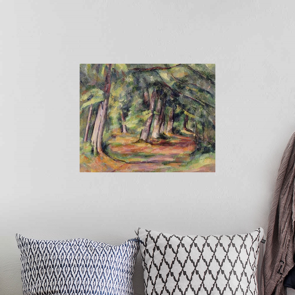 A bohemian room featuring "Under the Forest," a classic impressionist painting of a path through a wooded glade, with branc...