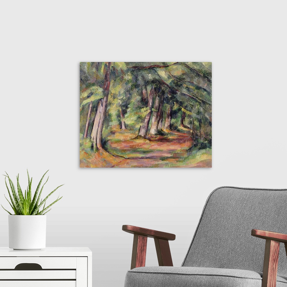 A modern room featuring "Under the Forest," a classic impressionist painting of a path through a wooded glade, with branc...